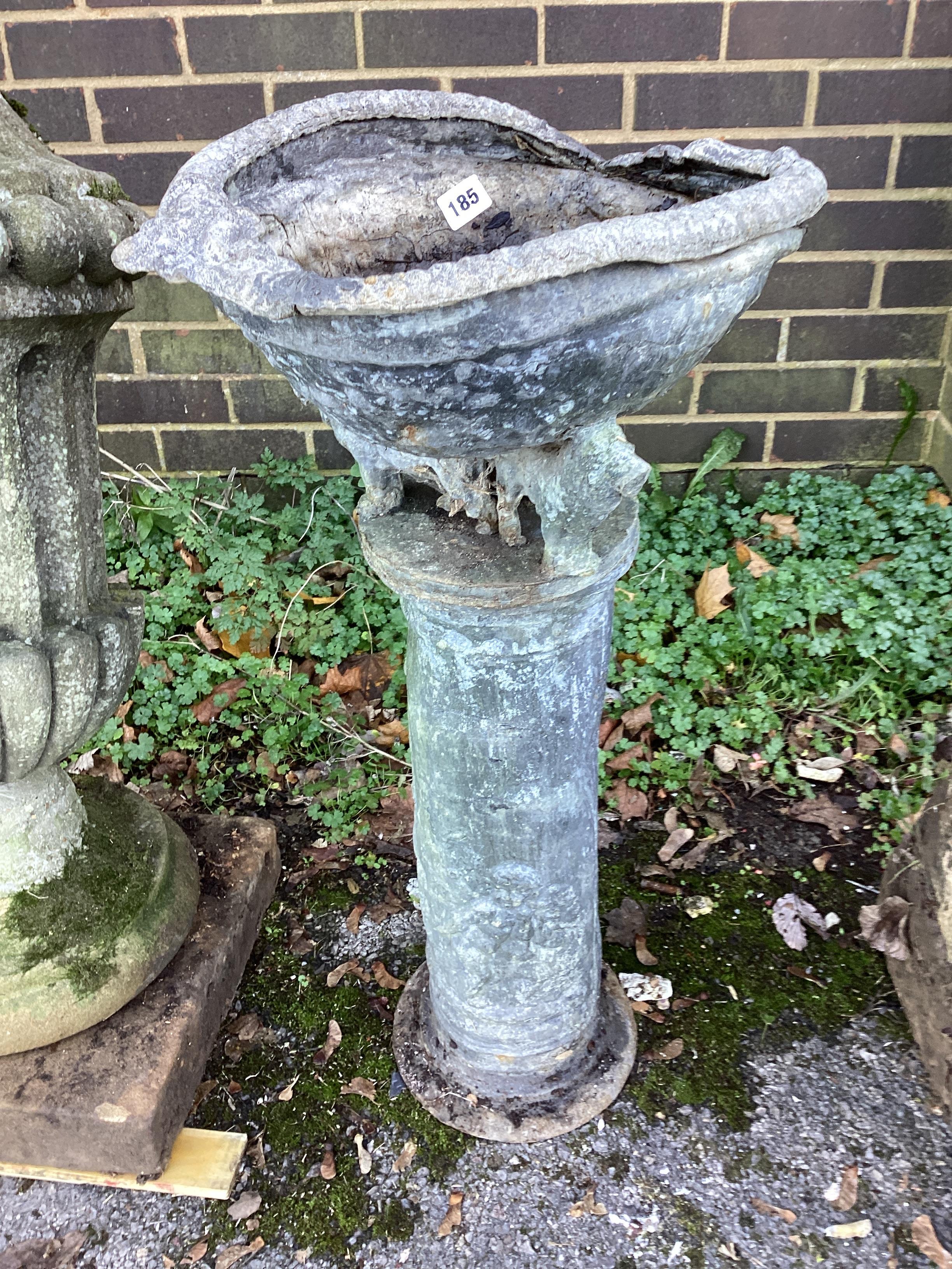 A Victorian lead bird bath on circular pillar, height 75cm